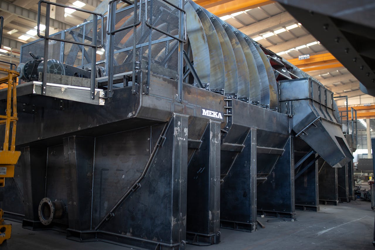 approach-img Powerful industrial machinery in a factory setting, emphasizing engineering excellence.